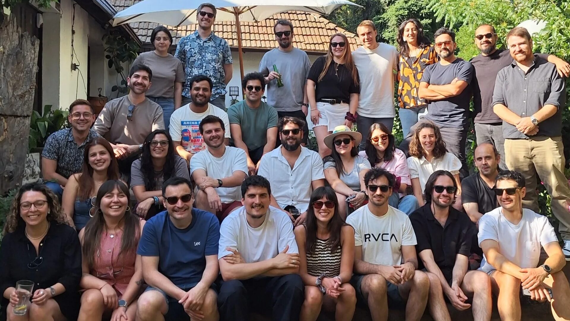 Hyphen team members from our Santiago office posing for a group photo